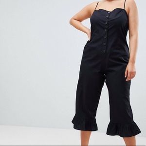 Asos curve black jumpsuit with ruffle leg.